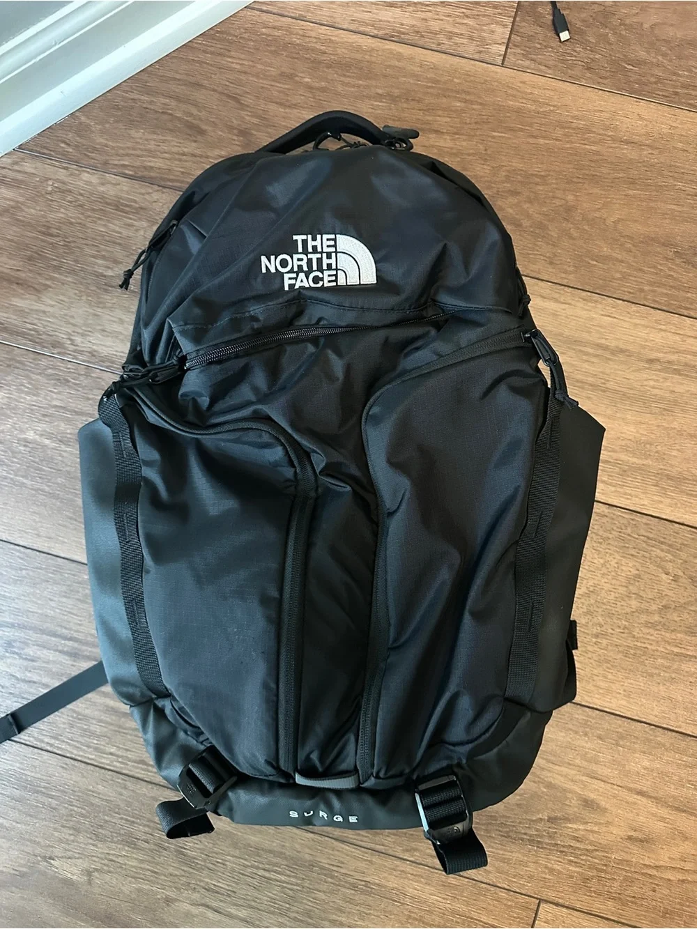 The North Face Black Surge Backpack with Front Organizer Pockets